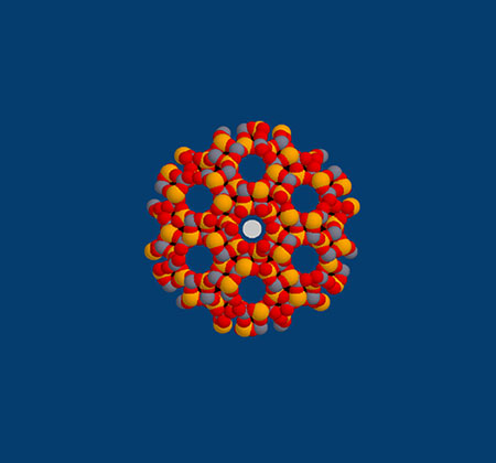 An all-atom model for the crystal structure of AlPO4-31 showing two simple spherical molecules adsorbed.